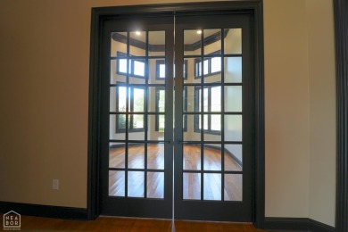 This stunning all-brick home, has been completely remodeled to on RidgePointe Country Club in Arkansas - for sale on GolfHomes.com, golf home, golf lot