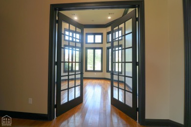This stunning all-brick home, has been completely remodeled to on RidgePointe Country Club in Arkansas - for sale on GolfHomes.com, golf home, golf lot