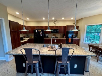 Elegant two-story home perfectly positioned on the #4 hole of on Glade Springs Resort Golf Course in West Virginia - for sale on GolfHomes.com, golf home, golf lot