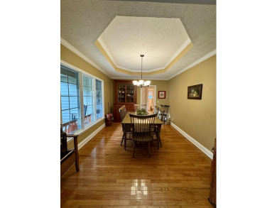 Elegant two-story home perfectly positioned on the #4 hole of on Glade Springs Resort Golf Course in West Virginia - for sale on GolfHomes.com, golf home, golf lot
