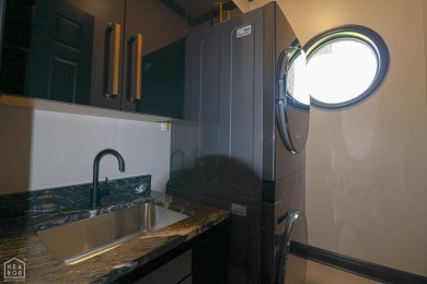 This stunning all-brick home, has been completely remodeled to on RidgePointe Country Club in Arkansas - for sale on GolfHomes.com, golf home, golf lot