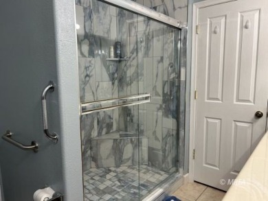 exceptionally well maintained (town)home with upgrades galore in on Coyote Willows Golf Club in Nevada - for sale on GolfHomes.com, golf home, golf lot