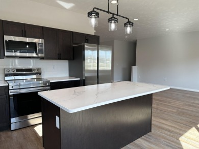Let's take a look at this new build in Akron, Iowa. This on Akron Golf Course in Iowa - for sale on GolfHomes.com, golf home, golf lot