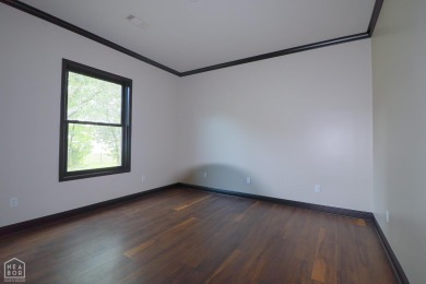 This stunning all-brick home, has been completely remodeled to on RidgePointe Country Club in Arkansas - for sale on GolfHomes.com, golf home, golf lot