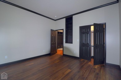 This stunning all-brick home, has been completely remodeled to on RidgePointe Country Club in Arkansas - for sale on GolfHomes.com, golf home, golf lot
