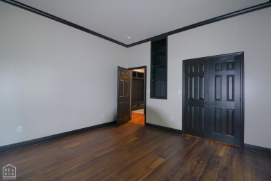 This stunning all-brick home, has been completely remodeled to on RidgePointe Country Club in Arkansas - for sale on GolfHomes.com, golf home, golf lot
