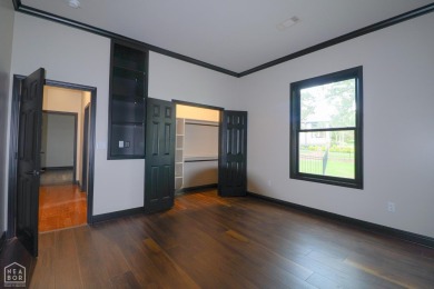 This stunning all-brick home, has been completely remodeled to on RidgePointe Country Club in Arkansas - for sale on GolfHomes.com, golf home, golf lot