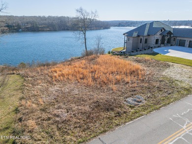 Exceptional flat, build-ready lakefront lot offering on River Run Golf Club in Tennessee - for sale on GolfHomes.com, golf home, golf lot
