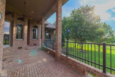 This stunning all-brick home, has been completely remodeled to on RidgePointe Country Club in Arkansas - for sale on GolfHomes.com, golf home, golf lot