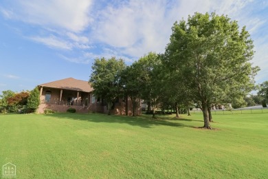 This stunning all-brick home, has been completely remodeled to on RidgePointe Country Club in Arkansas - for sale on GolfHomes.com, golf home, golf lot