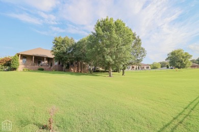 This stunning all-brick home, has been completely remodeled to on RidgePointe Country Club in Arkansas - for sale on GolfHomes.com, golf home, golf lot