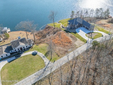Exceptional flat, build-ready lakefront lot offering on River Run Golf Club in Tennessee - for sale on GolfHomes.com, golf home, golf lot