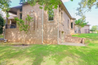 This stunning all-brick home, has been completely remodeled to on RidgePointe Country Club in Arkansas - for sale on GolfHomes.com, golf home, golf lot