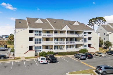 This efficiency condo is tucked away from the busy tourist scene on Beachwood Golf Club in South Carolina - for sale on GolfHomes.com, golf home, golf lot