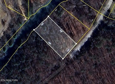 Gently sloping, build-ready lakefront lot offering approximately on River Run Golf Club in Tennessee - for sale on GolfHomes.com, golf home, golf lot