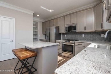 Mountain and golf course view home in The Preserve, a lake-front on The Preserve 9 Hole Golf Course in Tennessee - for sale on GolfHomes.com, golf home, golf lot