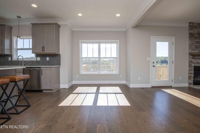 Mountain and golf course view home in The Preserve, a lake-front on The Preserve 9 Hole Golf Course in Tennessee - for sale on GolfHomes.com, golf home, golf lot