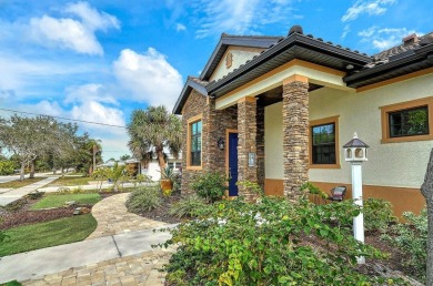 This custom-built island home represents Florida living at its on Lake Venice Golf Club in Florida - for sale on GolfHomes.com, golf home, golf lot