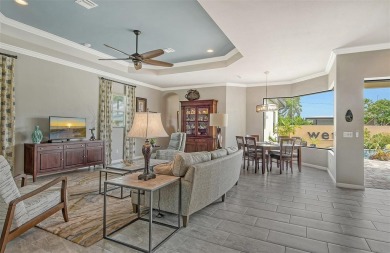 This custom-built island home represents Florida living at its on Lake Venice Golf Club in Florida - for sale on GolfHomes.com, golf home, golf lot