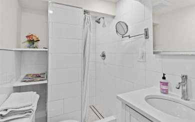 Welcome to 2 Hamilton Street - a newly renovated, one-of-a-kind on Bethpage State Park Golf Course - Black in New York - for sale on GolfHomes.com, golf home, golf lot