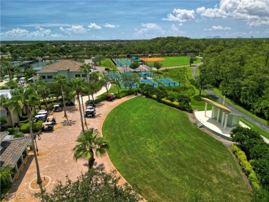 Enjoy maintenance-free living in this top-floor corner condo on Pelican Preserve Golf Club in Florida - for sale on GolfHomes.com, golf home, golf lot