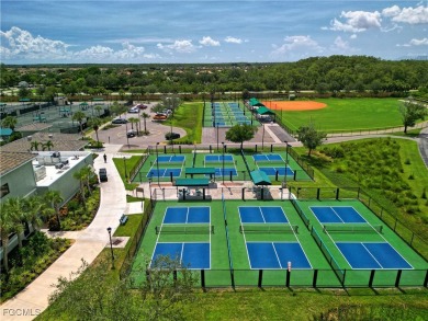 Enjoy maintenance-free living in this top-floor corner condo on Pelican Preserve Golf Club in Florida - for sale on GolfHomes.com, golf home, golf lot