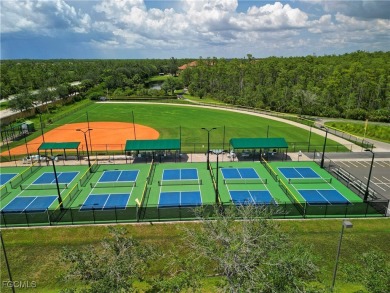 Enjoy maintenance-free living in this top-floor corner condo on Pelican Preserve Golf Club in Florida - for sale on GolfHomes.com, golf home, golf lot