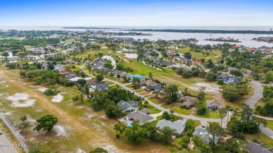 CURRENTLY UNDER CONTRACT, SELLER WILL CONSIDER BACKUP OFFERS on Bay Point Resort Golf Club in Florida - for sale on GolfHomes.com, golf home, golf lot
