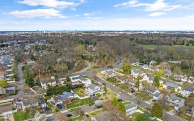 Welcome to 2 Hamilton Street - a newly renovated, one-of-a-kind on Bethpage State Park Golf Course - Black in New York - for sale on GolfHomes.com, golf home, golf lot