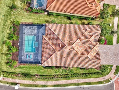 This home features the popular Summerville open concept floor on Ritz-Carlton Members Golf Club in Florida - for sale on GolfHomes.com, golf home, golf lot