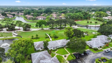 Exceptional villa at in PGA National Resort has a perfect on PGA National Golf Club in Florida - for sale on GolfHomes.com, golf home, golf lot