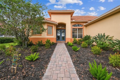 This stunning, fully REMODELED barrel tile roof Verona model on Stonegate Golf Club in Florida - for sale on GolfHomes.com, golf home, golf lot