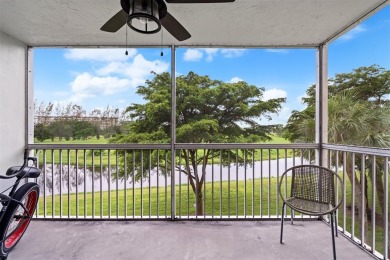 Stop renting and start owning! This move-in ready flip or on Palm-Aire Country Club and Resort - The Oaks in Florida - for sale on GolfHomes.com, golf home, golf lot