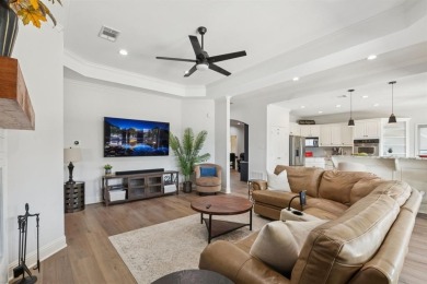 Experience the pinnacle of lakeside luxury with this exquisitely on Cedar Creek Country Club in Texas - for sale on GolfHomes.com, golf home, golf lot