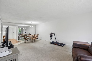 Stop renting and start owning! This move-in ready flip or on Palm-Aire Country Club and Resort - The Oaks in Florida - for sale on GolfHomes.com, golf home, golf lot