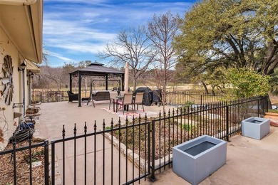 Experience refined, resort-style living in this low-maintenance on De Cordova Bend Country Club in Texas - for sale on GolfHomes.com, golf home, golf lot