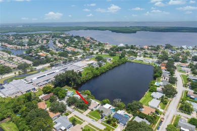 One or more photo(s) has been virtually staged. **NO FLOODING OR on Mangrove Bay Golf Course in Florida - for sale on GolfHomes.com, golf home, golf lot