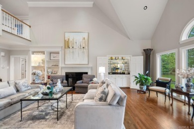 Welcome inside this light-filled home located on the 1st fairway on Chenal Country Club - Bear Den Mountain in Arkansas - for sale on GolfHomes.com, golf home, golf lot