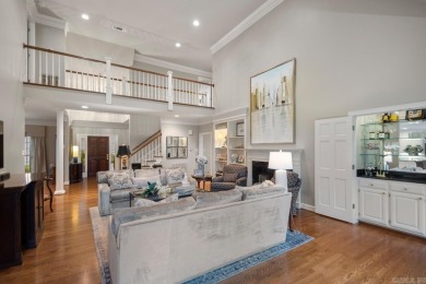 Welcome inside this light-filled home located on the 1st fairway on Chenal Country Club - Bear Den Mountain in Arkansas - for sale on GolfHomes.com, golf home, golf lot