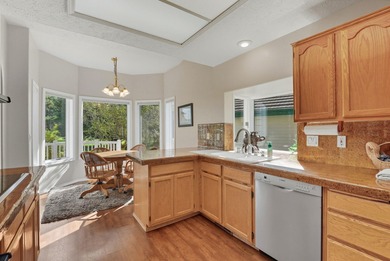 Experience Liberty Lake Golf Course Living at its finest in the on Meadow Wood Golf Course in Washington - for sale on GolfHomes.com, golf home, golf lot