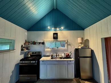 This well-built and thoughtfully designed 476 sq ft studio on Volcano Golf and Country Club in Hawaii - for sale on GolfHomes.com, golf home, golf lot