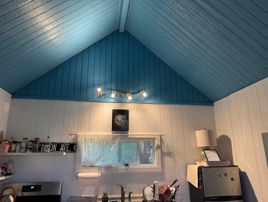 This well-built and thoughtfully designed 476 sq ft studio on Volcano Golf and Country Club in Hawaii - for sale on GolfHomes.com, golf home, golf lot