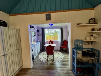 This well-built and thoughtfully designed 476 sq ft studio on Volcano Golf and Country Club in Hawaii - for sale on GolfHomes.com, golf home, golf lot