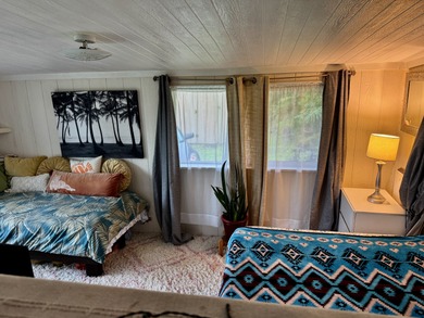 This well-built and thoughtfully designed 476 sq ft studio on Volcano Golf and Country Club in Hawaii - for sale on GolfHomes.com, golf home, golf lot