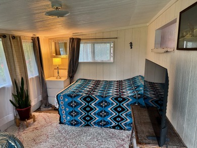 This well-built and thoughtfully designed 476 sq ft studio on Volcano Golf and Country Club in Hawaii - for sale on GolfHomes.com, golf home, golf lot