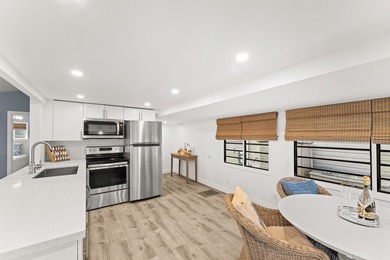 Charming and renovated, this 2-bedroom, 1-bath retreat is on Island Dunes Country Club in Florida - for sale on GolfHomes.com, golf home, golf lot