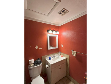 If you are looking for a smaller house with a big big yard on a on Cherokee Village North Course in Arkansas - for sale on GolfHomes.com, golf home, golf lot
