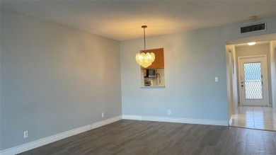Spacious 2/2 condo in the desirable 55+ community of Palm on Oriole Golf and Tennis Club in Florida - for sale on GolfHomes.com, golf home, golf lot