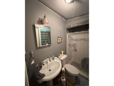 If you are looking for a smaller house with a big big yard on a on Cherokee Village North Course in Arkansas - for sale on GolfHomes.com, golf home, golf lot