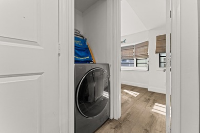 Charming and renovated, this 2-bedroom, 1-bath retreat is on Island Dunes Country Club in Florida - for sale on GolfHomes.com, golf home, golf lot